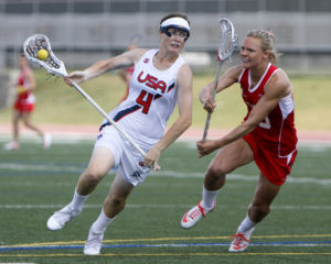 OSHAWA, ON - Jul 19 : The 2013 FIL, Women's World Cup Lacrosse Tournament, Katrina Dowd #4 of Team United States runs with the ball during the first half. (Photo by Brian Watts / via GDP) ,